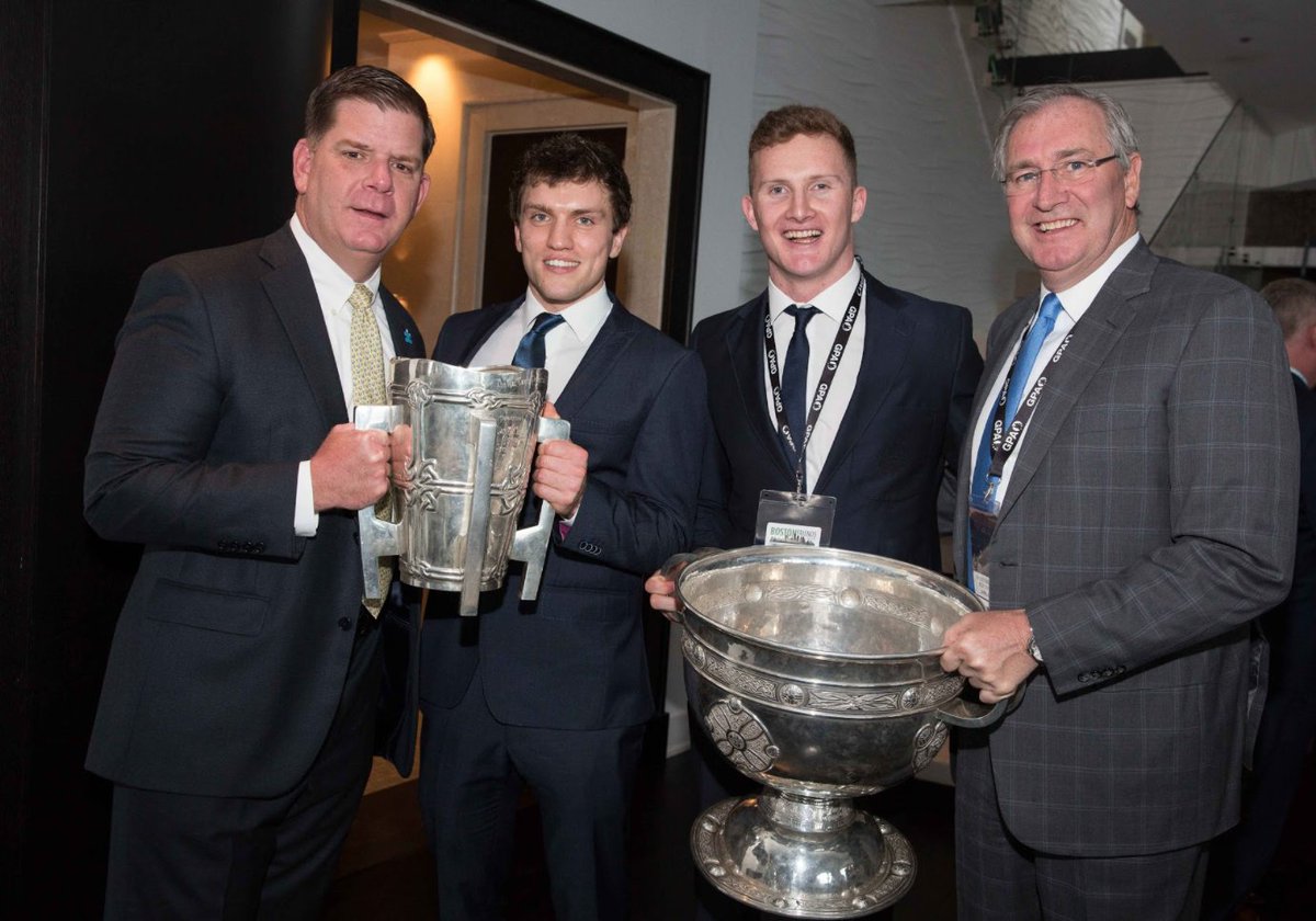 GPABoston's tweet photo. Mayor Walsh at the GPA reception with Clare hurler, Shane O'Donnell, Dublin footballer, Ciaran Kilkenny, our Chairman, Aidan Browne, and some familiar hardware! @marty_walsh @townhurler @CKKilkenny93 @afbrowneIrl #weseepeople https://t.co/aJJI4RQHUB