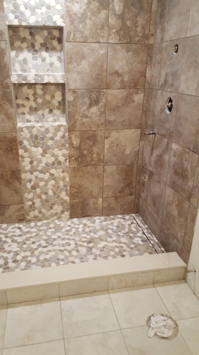 BKZContractors's tweet photo. Tile is grouted 
#Bathrooms 
#remodel https://t.co/0oweSOhoDe