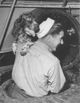 AncientSubHunt's tweet photo. USS Sea Robin (SS-407) mascot going below. Patsy, a member of the crew for some time, takes her station in the control room during diving exercises, otherwise she can be found close to the cook."

(Crew photo) https://t.co/cq3UDLsUCP