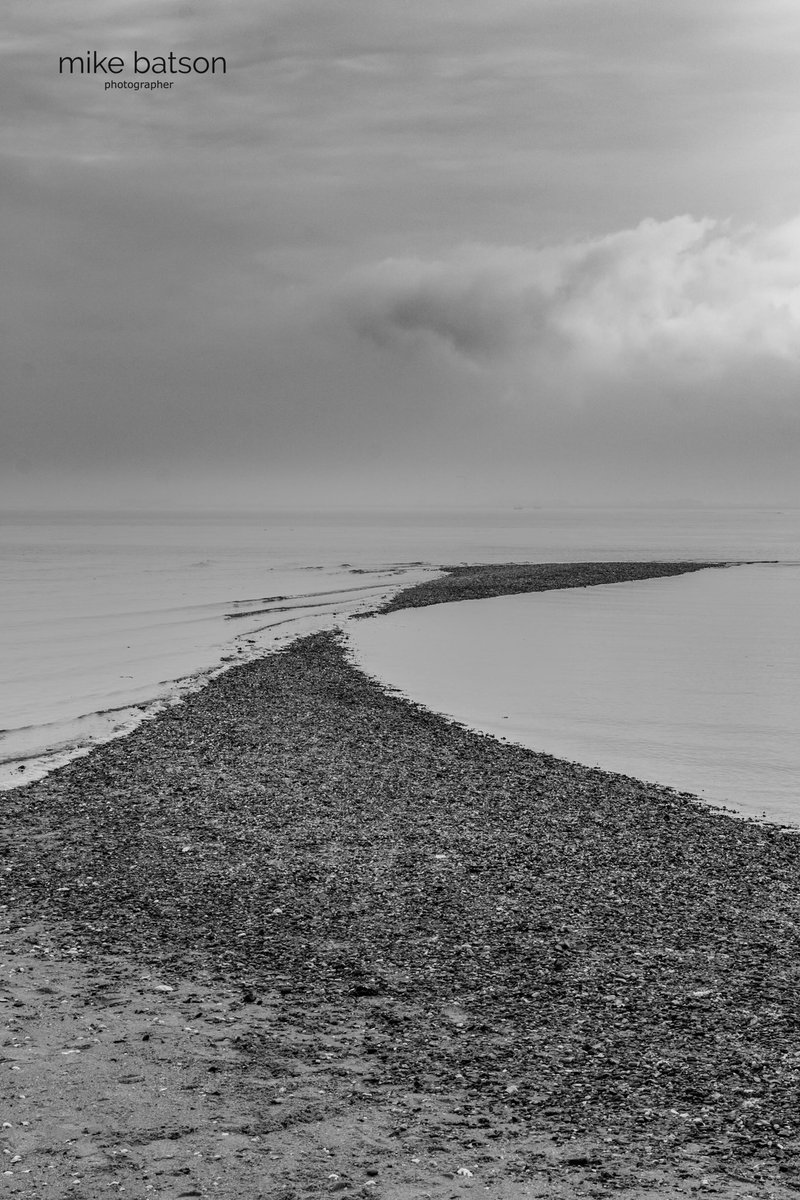The #coastline of #England can be so varied from sandy #beaches to rocky ledges. This is #Merseaisland in the #Blackwater &amp; #Colne #estuaries #Essex known for its #oysters &amp; #History #blackandwhitephotography #seascape
