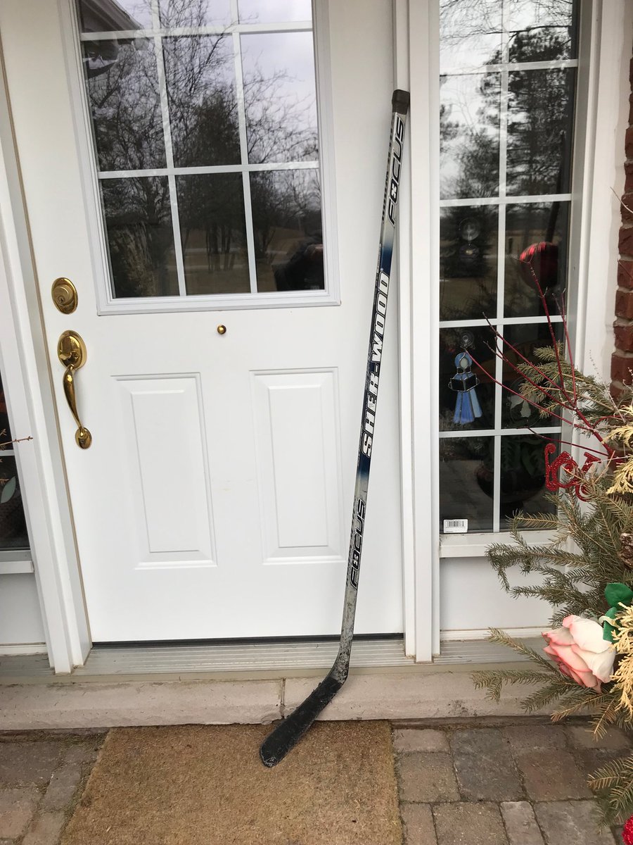 A hockey stick at the door to remember the players from Humboldt. Tragic.