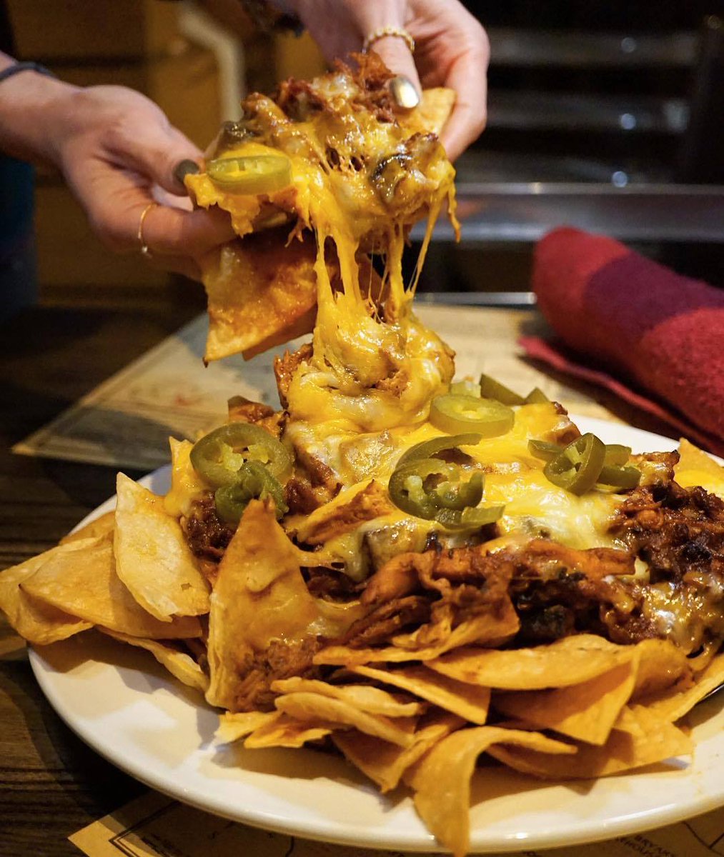 Virgilsrealbbq's tweet photo. What makes Virgil’s BBQ Nachos the best thing on earth? BBQ Pulled Chicken, Carolina Pulled Pork, Texas Beef Brisket, and most important a lot of CHEESE. #nachos #bbqhaven #nachoslover #southernstyle https://t.co/DaMGMKfEsz