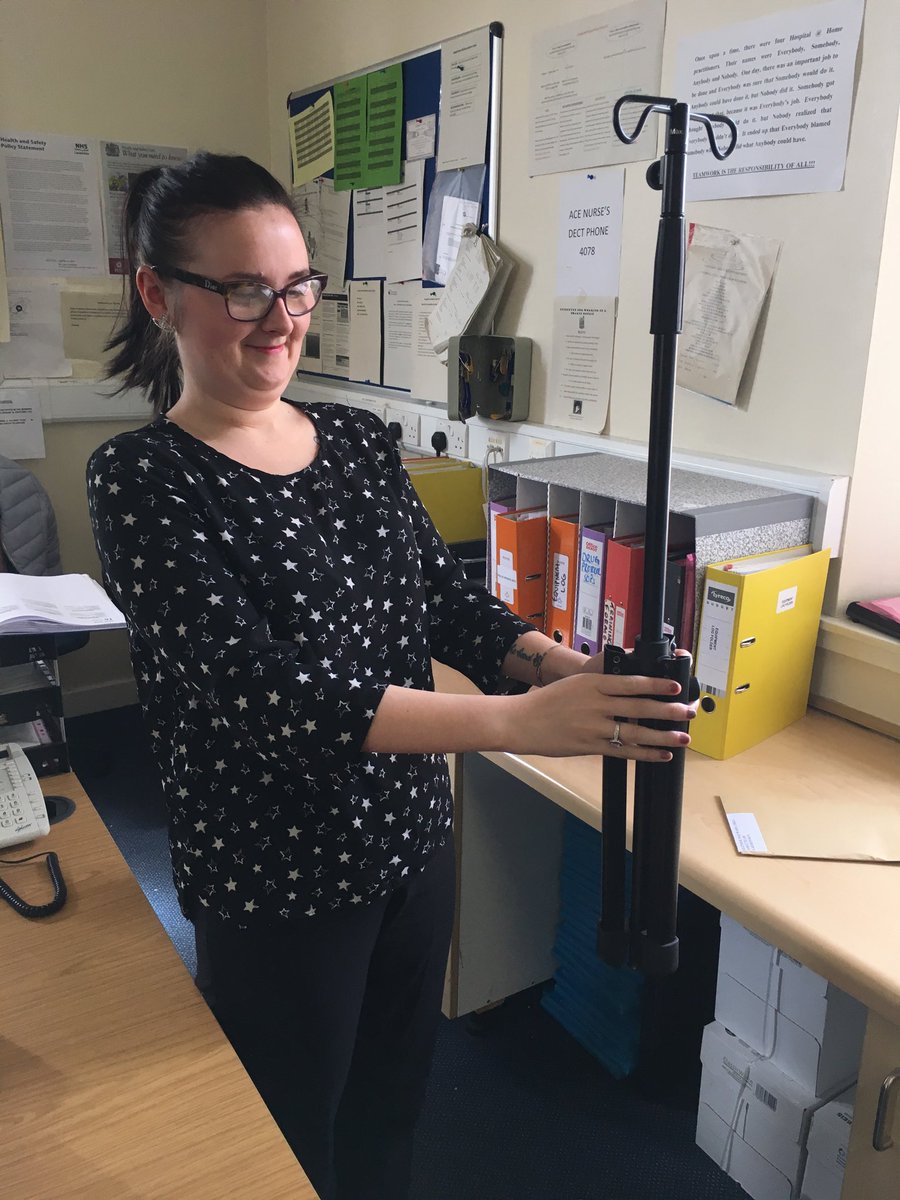 Kimberly modelling our new folding drip stands for Hospital at Home. Extend to 2m. Bought after patient feedback!