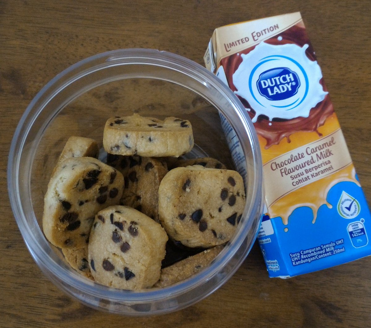 crabbicalamari's tweet image. A log of #shortbreadcookie dough, cut and baked. Tasted fine (bit too sweet for me), but not sure if I want to do this again. Would rather not wait for it to chill.