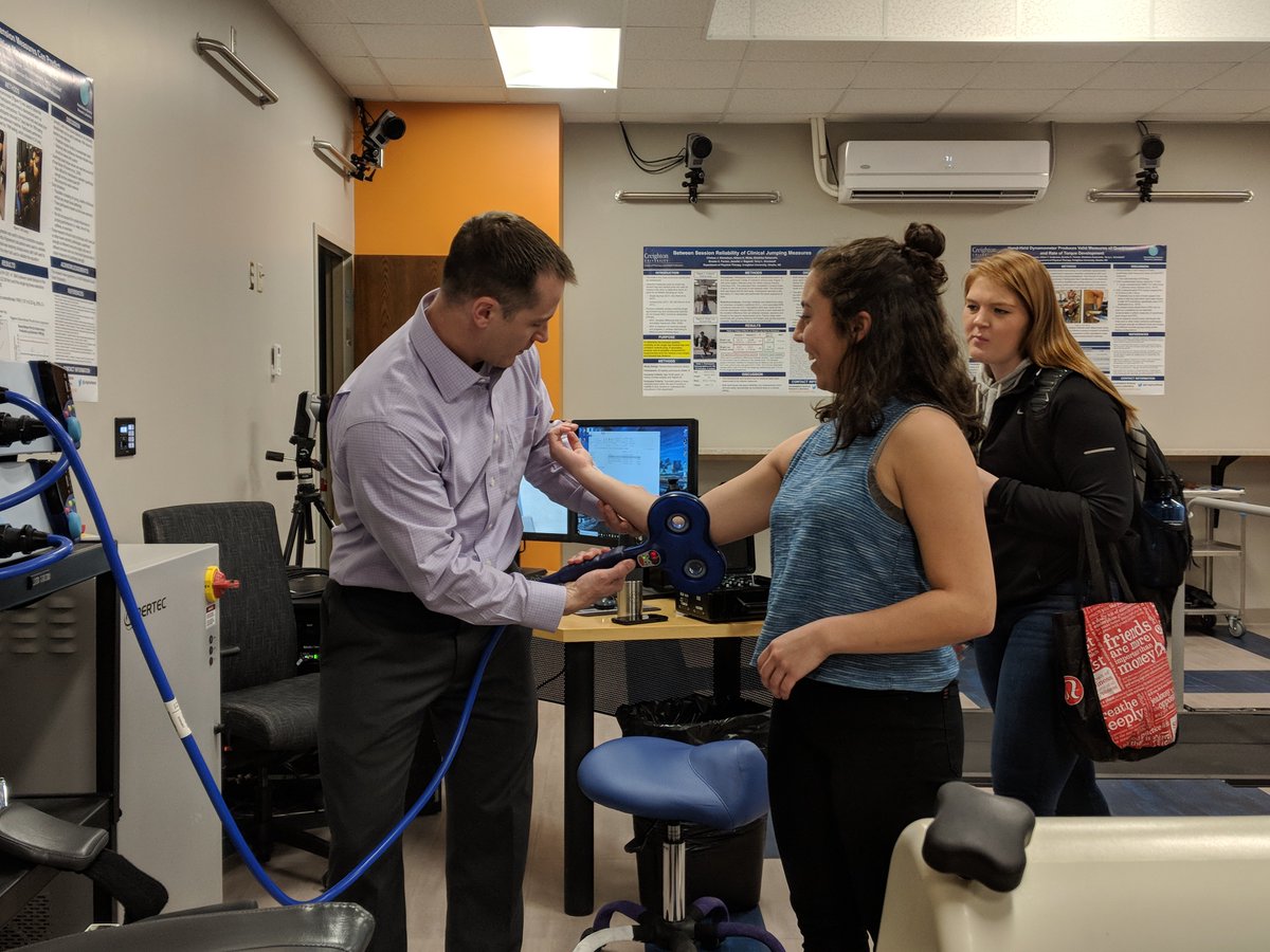 CreightonRehab's tweet photo. Yesterday we celebrated @BiomechanicsDay in the lab. Thank you to all who came out to help us celebrate! Check out @GrindstaffTL showing off the magstim and Dr's Katsavelis and Kyvelidou demonstrating our eye tracking software. #NBD2018 https://t.co/XVcIz50b7Y