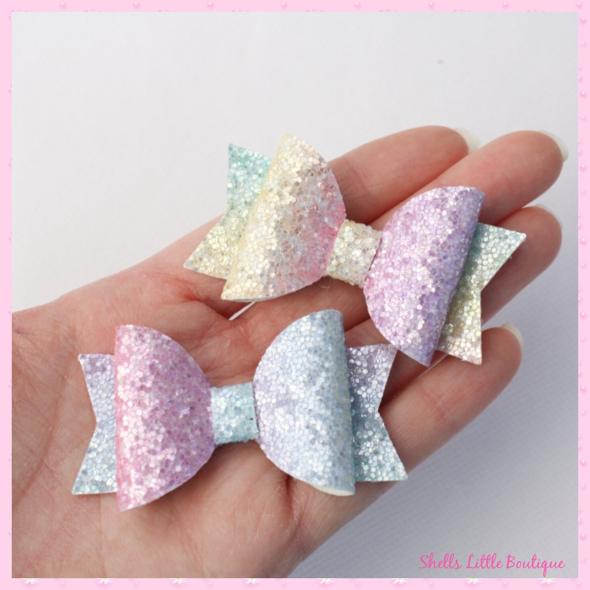 shells_boutique's tweet photo. Small rainbow glitter bows. These can be purchased individual or as a set of two. Perfect for pigtails https://t.co/qRJ82w88Zx 

#hairaccessories #hairbows #smallbiz https://t.co/cMVzENcuYE