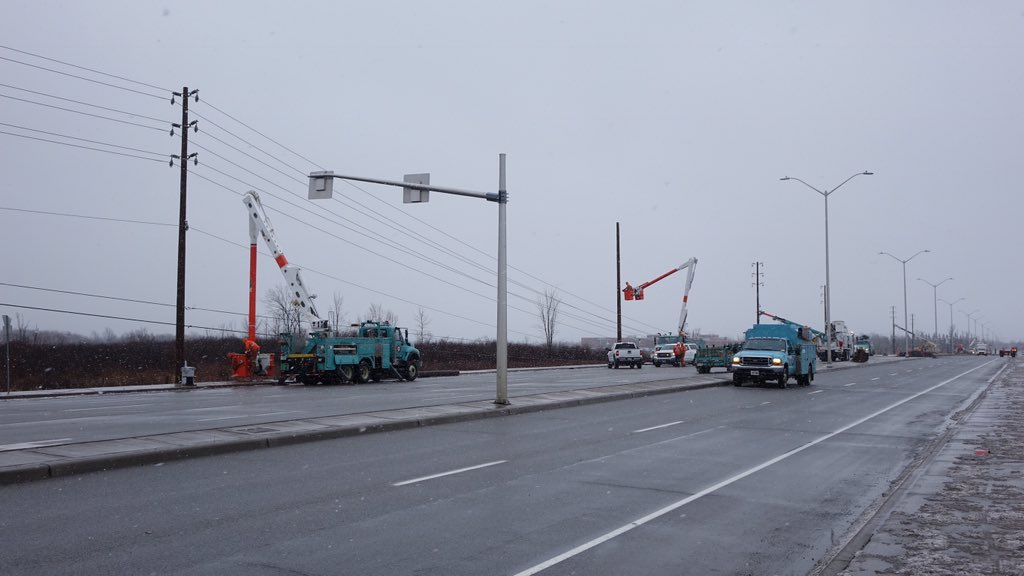 GiacomoPanico's tweet photo. Hydro Ottawa crew at Limebank tell me they’re hoping to reopen road by PM rush hour. 20 poles needed replacing #ottnews https://t.co/zUhM0ksv2o