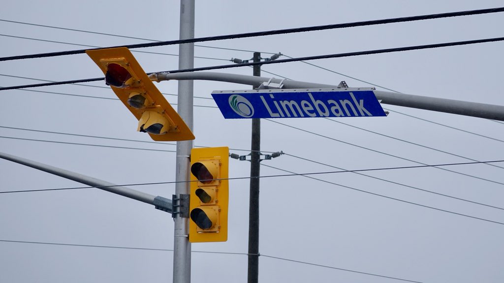GiacomoPanico's tweet photo. Hydro Ottawa crew at Limebank tell me they’re hoping to reopen road by PM rush hour. 20 poles needed replacing #ottnews https://t.co/zUhM0ksv2o