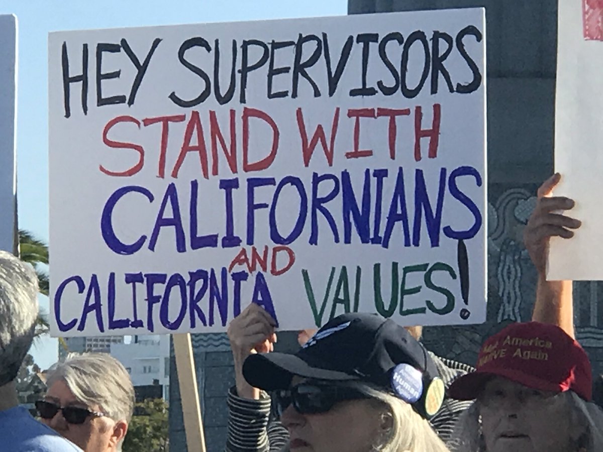 SDIndivisible's tweet photo. Hey Ron, Diane, Bill, Greg, & Kristin!
We see you!
You can’t hide while you take this shameful vote.
People’s lives are at stake. If you don’t care about that, think about your legacies.
You’re casting a Prop 187-esque vote today #Consequences
Best,
#SDStandsUp
#StandWithCA https://t.co/o1EPvlmegf
