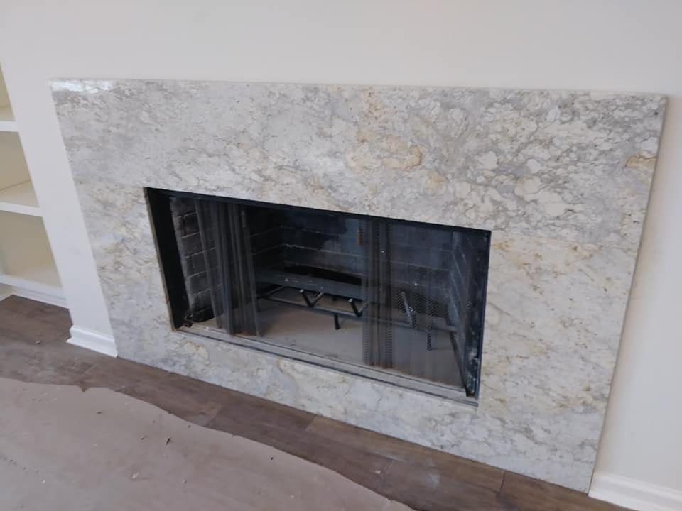 GraniteKingLBK's tweet photo. Here is one of our exotic colors of granite that has some movement to it. This rock is called Giallo Twister Gold. We love the granite around the fireplace! https://t.co/SghB98Capv