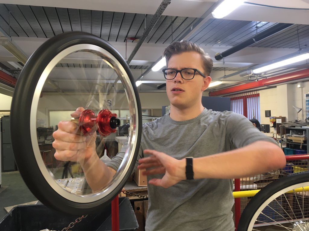 Master wheel-builder Jake Wilkinson-Filmer checking that the Green Dragon custom wheels run true #precision #greenpower #thirdattempt