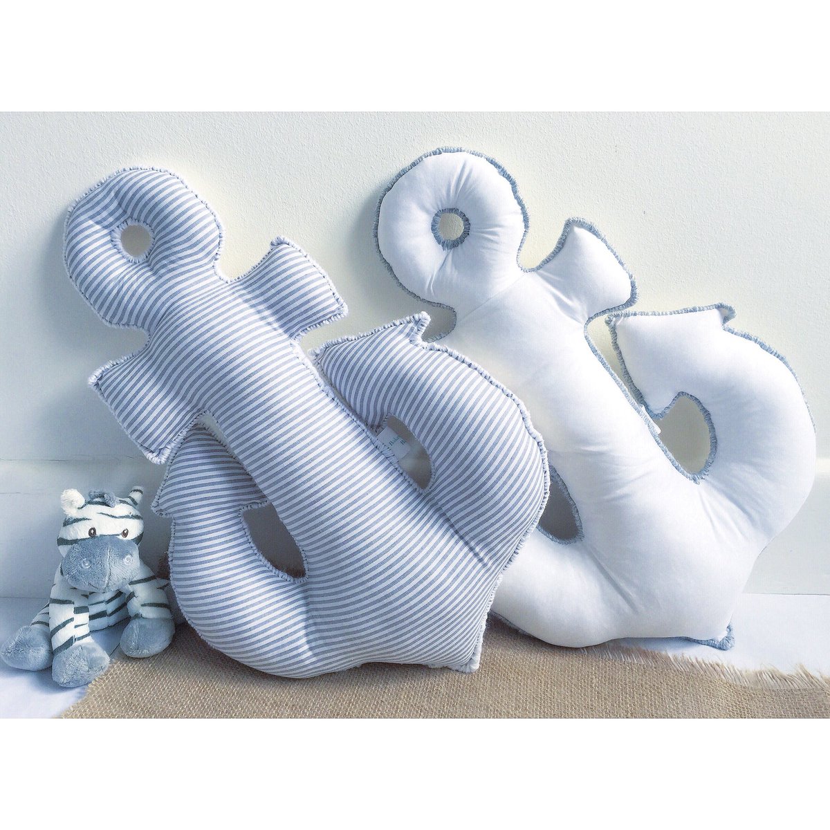 BakedBeanBaby's tweet photo. Morning lovely people! Do you know how happy these anchor cushions make me!!? I’d have anchor decor all over my house if I could! Here’s a couple from my order pile last week. I think they make fab nursery pieces and are only £15 each! ⚓️ 
#anchor #anchorcushion #anchordecor https://t.co/MivNf1JDqW