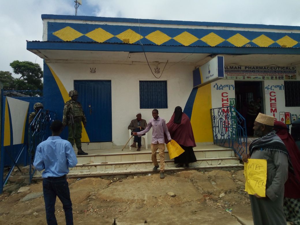 hassansalesa's tweet photo. KPLC offices remained closed and heavily guarded in Moyale as the peaceful demonstration against poor service provisions by @KenyaPower kicks off. @MboyaApollo https://t.co/D6t3dd6PDu