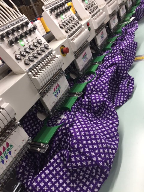 TarletonState's tweet photo. The first batch of Tarleton State+Vera Bradley is getting ready to ship to Stephenville! It’s a sea of purple in the workshop. 

Get yours exclusively from @Clublevelbrands  https://t.co/kCsqoowQYa https://t.co/MfctQRM9JS