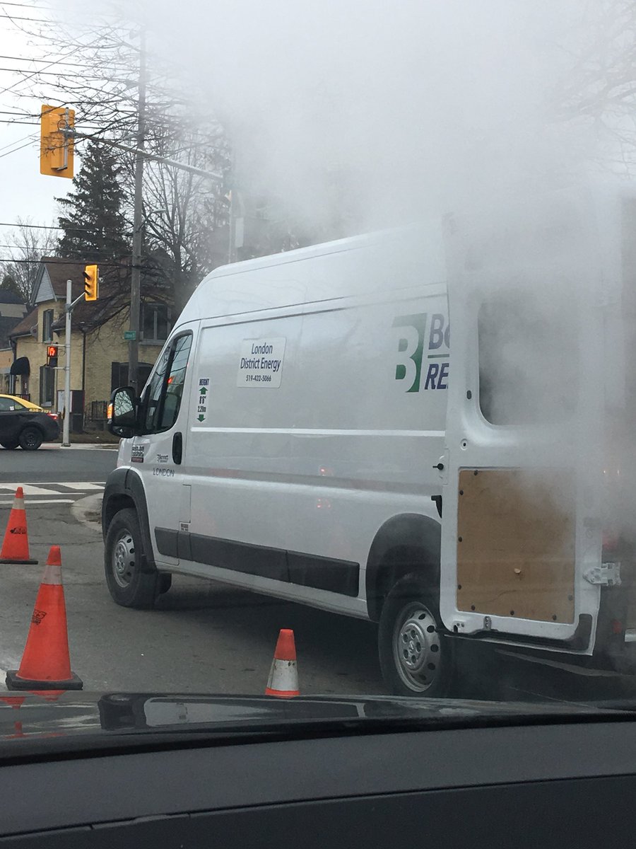 EspressoLdnont's tweet photo. @CityofLdnOnt look 👀 they fixed it yesterday - see the car there in the steam? It’s there. just like the bike 🚲 (can’t see it though) #danger #steamheating @LdnOntBikeCafe @CBCLondon #nevergetsfixed https://t.co/kHFaJj6ujT
