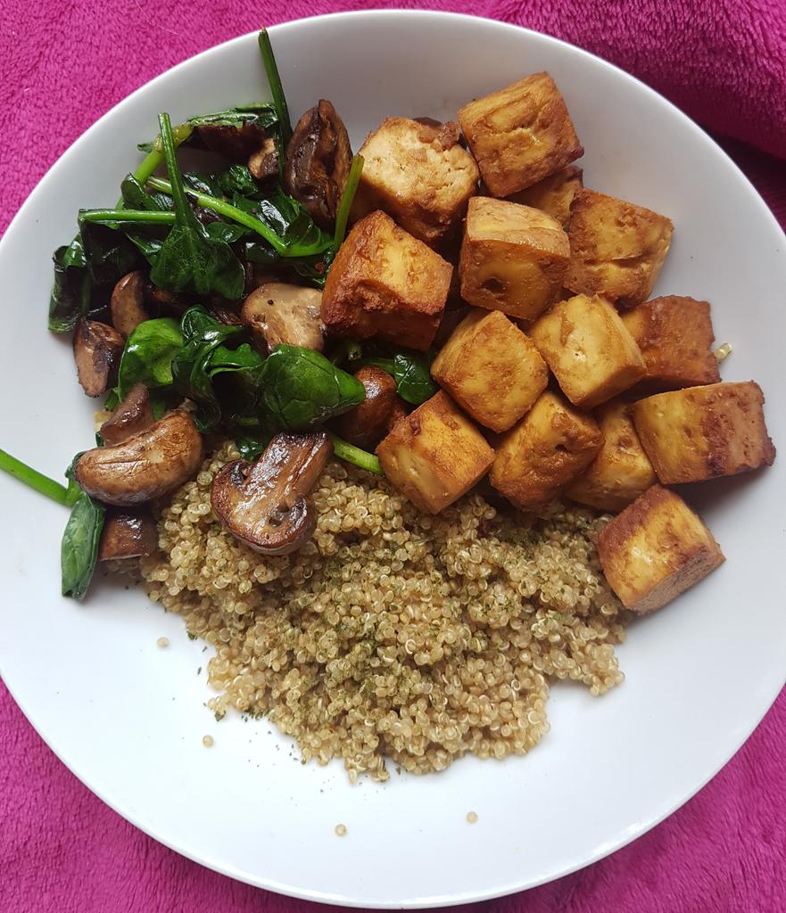 Tasty lunch today 😊 Marinated baked tofu, quinoa with parsley, and mushrooms and spinach fried in a little vegan butter and black pepper 💚 #vegan #veganfood #plantpower