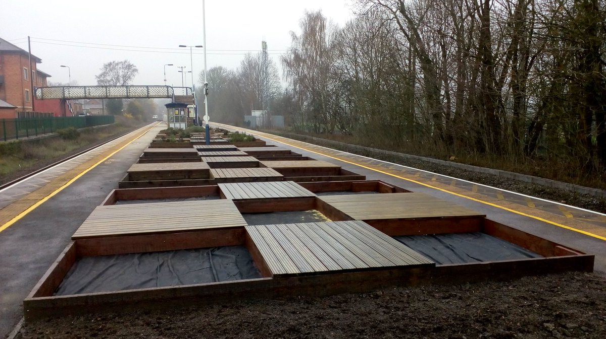 al70morley's tweet photo. Great work at Duffield by EMT staff, station adopters, Duffield Parish &amp; Derwent Valley CRP completing building of decking and planters in the rain #CommunityRail #EMT ready for planting up https://t.co/Q8plo4dmzL