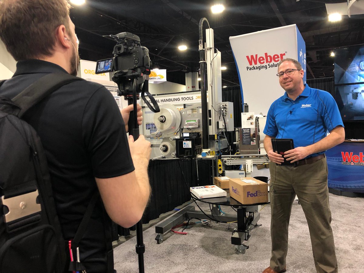 WeberPackaging's tweet photo. Shooting a video in our booth 1957 with Labeling Systems Product Manager Neal Oechsle at @MODEXShow in Atlanta. Stop and see labeling system innovation and get a free t-shirt! #printapply #divinedesignmarketing https://t.co/4CrYbv9PF4