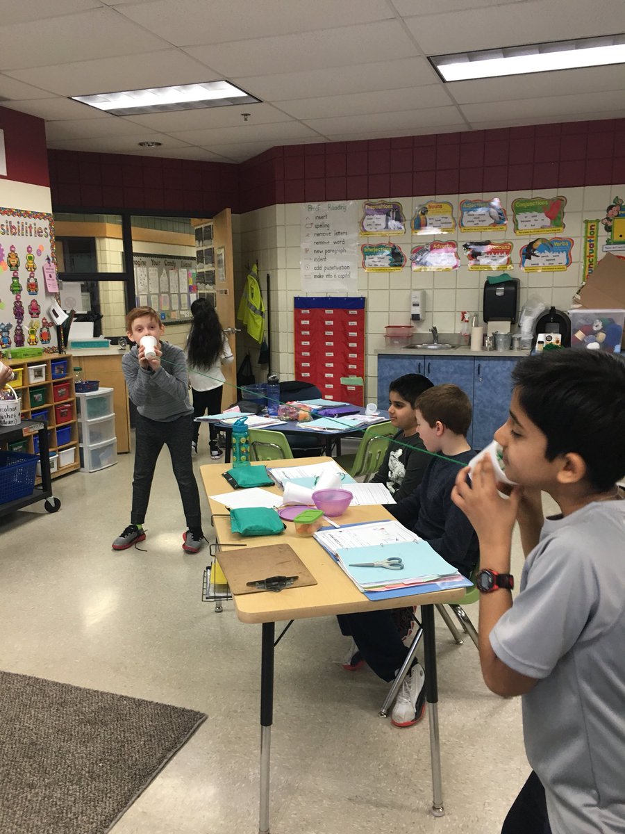 Braken2's tweet photo. Using cup telephones to explore sound in room 106 @islandLRSD https://t.co/c7AYa1YpKD