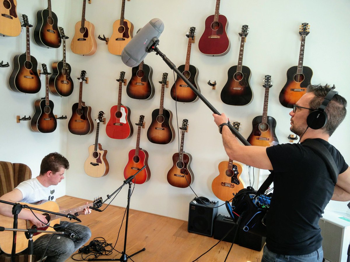YellowBrainGijs's tweet photo. What a horrible place for me as a guitar player to record sound today. Close-miking the @gibsonguitar J15 and picking up some room ambience through the stereo shotgun @tfoaguitars. #Mixpre #rycote #audiotechnica #neumann #Gibson https://t.co/1fcR8FuhWR