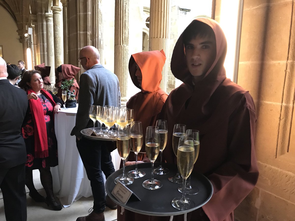 BenGalley's tweet photo. This event just got even more fantastical. Monks serving wine? Tiny trees with hors d'oeuvres in the branches? By Odin’s kneecaps. https://t.co/GA5xCn64PH