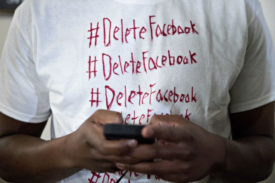 CNN's tweet photo. This attendee of Mark Zuckerberg's testimony before Congress is wearing a handmade shirt that says "#DeleteFacebook" https://t.co/k75BBSVpMg https://t.co/BIAe3Z6zLm