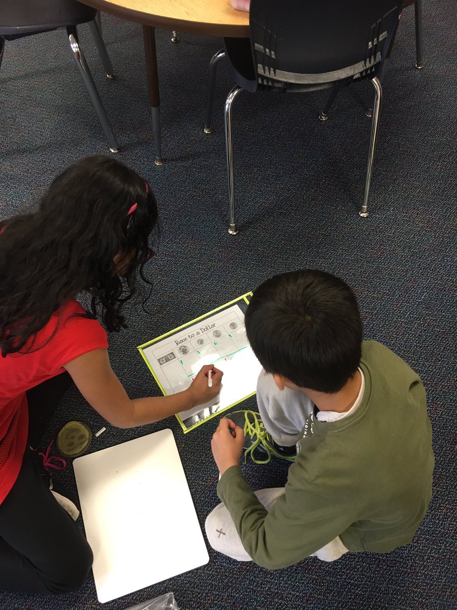 Playing Race to a Dollar. 2nd grade parents you will get a chance to play this game with your child at Ivyhill's showcase #ivyhillleague