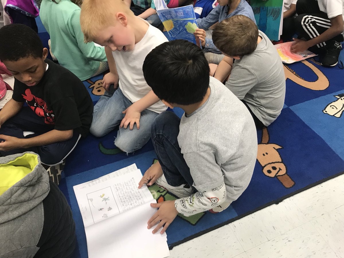 Reading our short animal stories to our kindergarten buddies #youngauthors #AmericanReading #CarrolltonES #IWCSchools