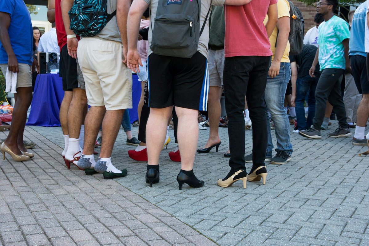 Students were invited to "Walk a Mile in Her Shoes" hosted by the Family Crisis Center of East Texas. Male students walked around campus in heels to bring awareness of sexual abuse for both men and women. 

Photo by Alyssa Faykus/The Pine Log
<a href="/SFASU/">Stephen F. Austin State University</a>