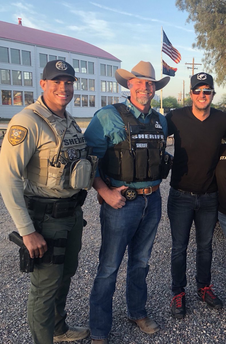 sherifflamb1's tweet photo. So Luke Bryan wanted a pic with the two Live PD stars. At least that’s what we told ourselves. Right @DeputyMcelwain ? @LukeBryanOnline https://t.co/aBPyn300Bn