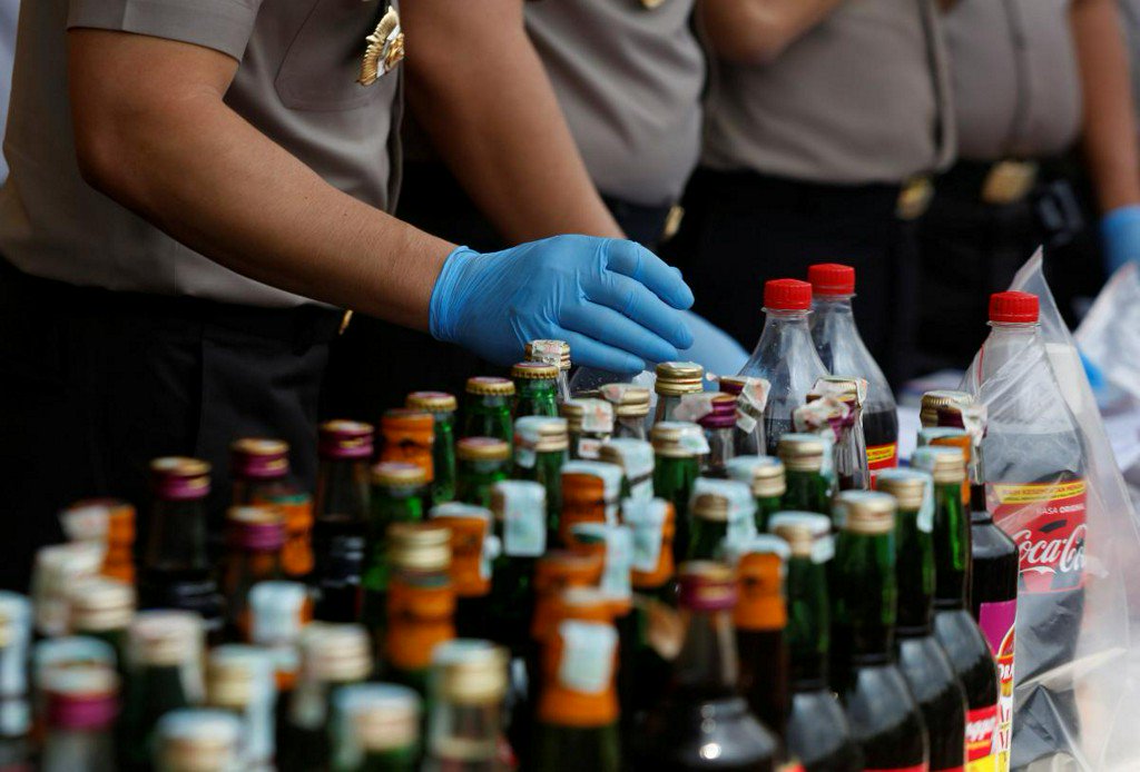 Reuters's tweet photo. Death toll from Indonesia tainted liquor rises to 82 https://t.co/j3cmkzOMNi https://t.co/VG2KlAwH5Y