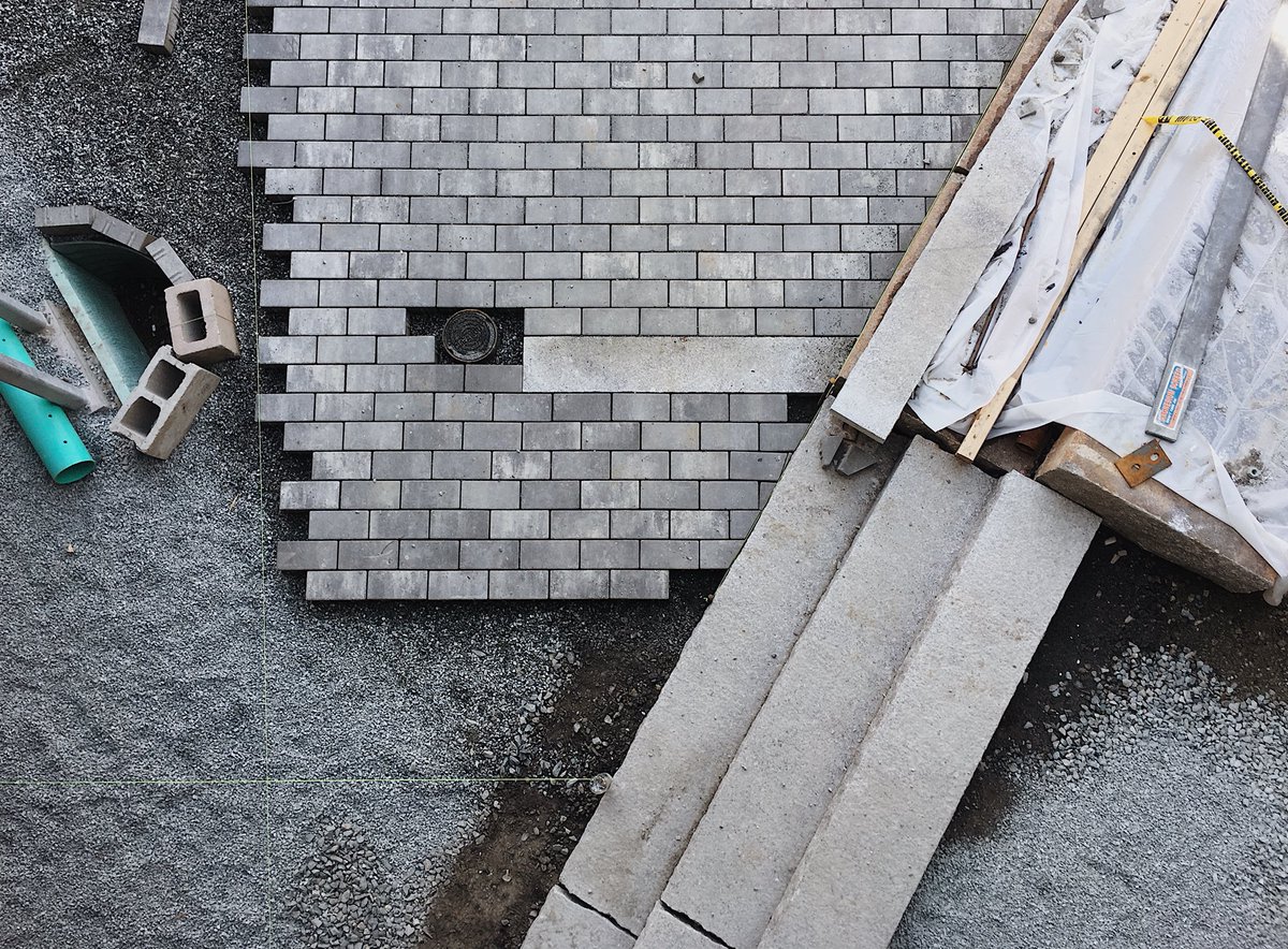 MerrittChase's tweet photo. Pavers, steps, and trees @bow_market courtyards are coming together #BuildingBow @remnantbrewing #landarch #landscapearchitecture https://t.co/2kPf79r71C