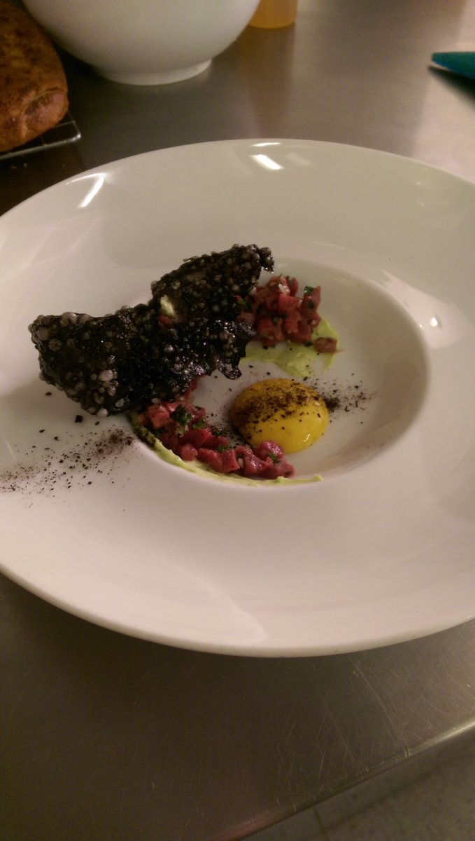 Beef tartar, wasabi, egg yolk purée and tapioca cracker