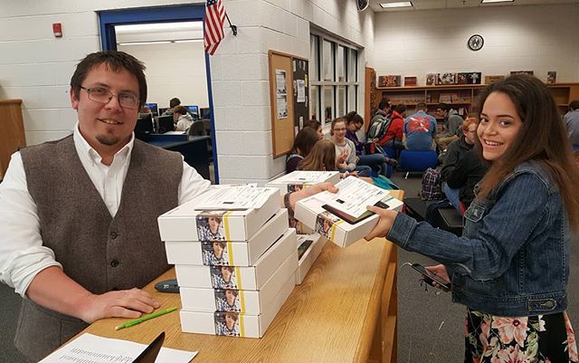 ShenCoVASchools's tweet photo. Tripp Ennis handing out free tablet with Internet access to Central High School student. Thanks to #Shentel and #Sprint. Program is in Strasburg and Stonewall Jackson High Schools as well. https://t.co/eRxDh43RkV https://t.co/SxacNDRoTB