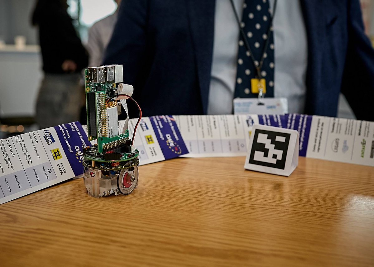 Staff from <a href="/isrc_magee/">ISRC</a> demo the latest research with EPSRC-funded (SPANNER) project partners from York University on robots that can automatically repair when faults occur. Picture from demo at the leading "Design, Automation and Test in Europe" conference - March 2018.