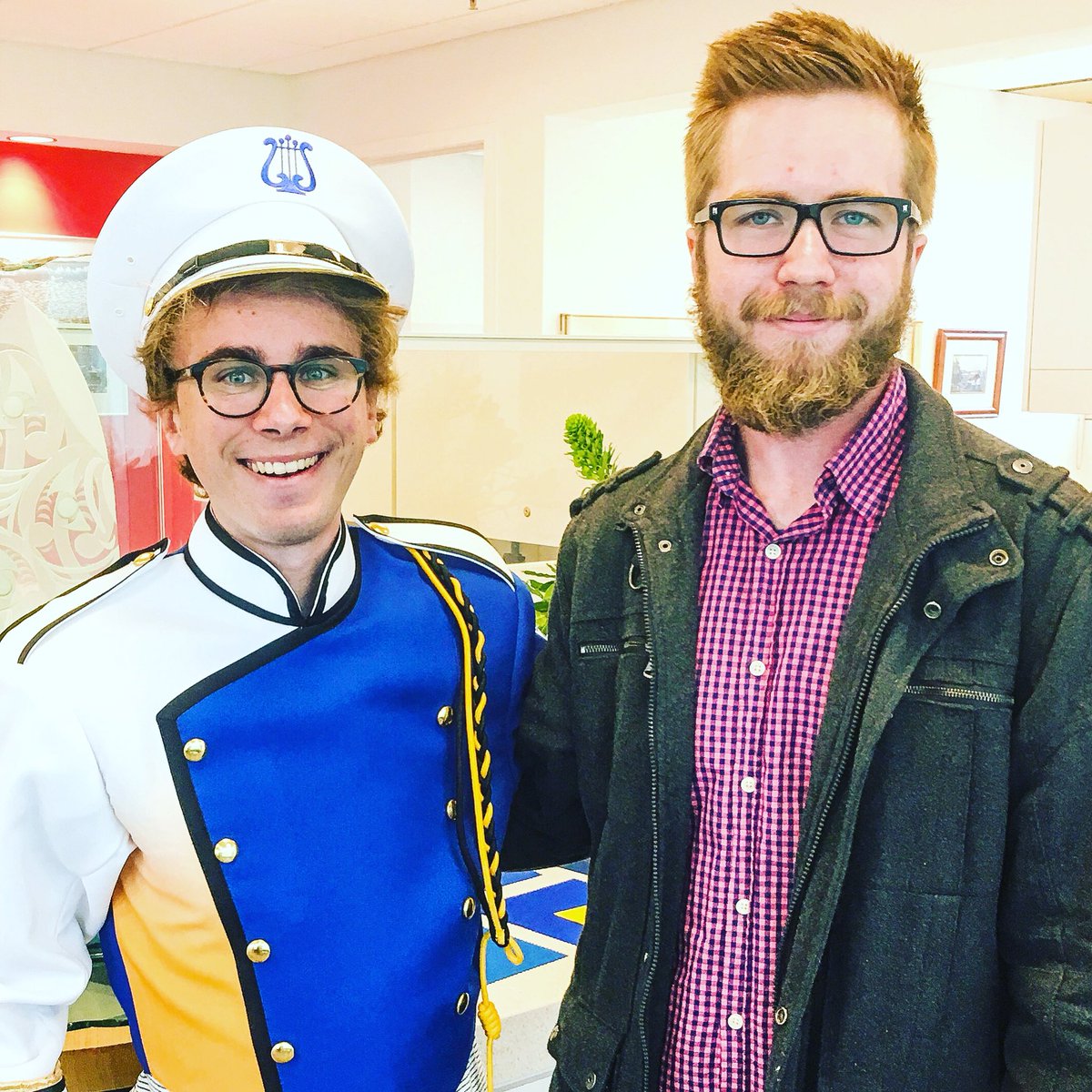 ubcprez's tweet photo. Dash Foster, UBC’s new band leader with Andy Ferguson. I’d say the new UBC band uniforms look pretty awesome. Can’t wait to see the whole band in uniform. https://t.co/9ivbN2zIpk