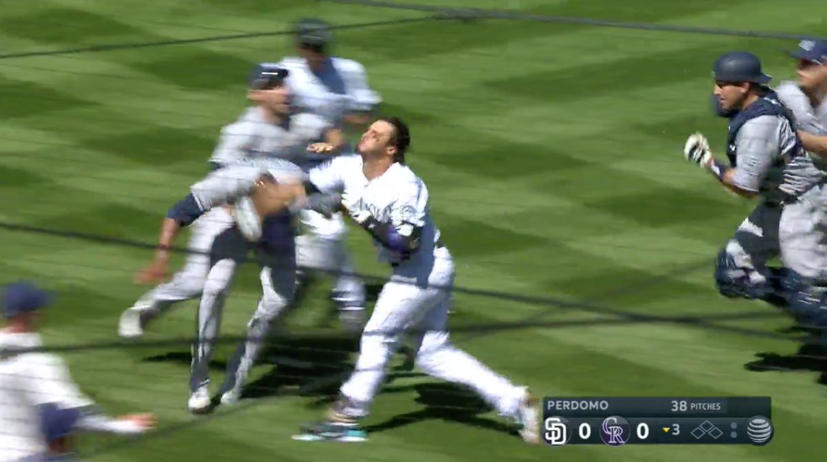 SInow's tweet photo. - Luis Perdomo throws behind Nolan Arenado
- Nolan Arenado charges the mound
- Perdomo throws his glove at  Arenado
- Arenado throws a punch
- Benches clear https://t.co/DhwkxkLBYD