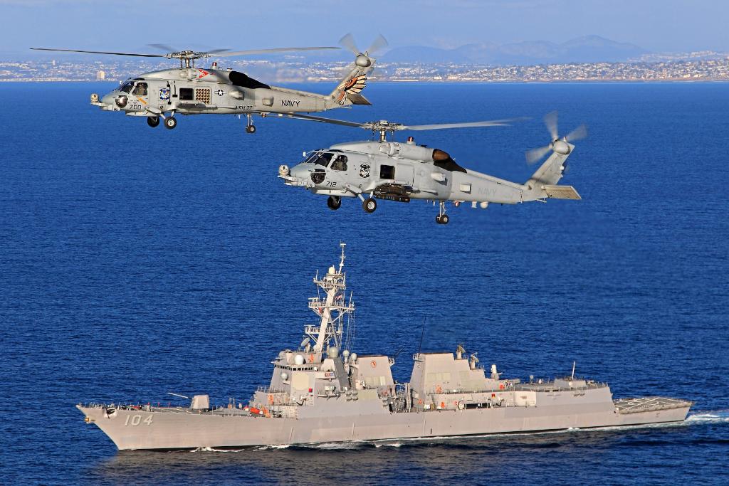 Sikorsky's tweet photo. With more than 475,000 flight hours for the @USNavy alone, the #MH60R is a proven submarine hunter. Learn how the #Seahawk serves navies around the globe: https://t.co/Y1iH5F1L0o #SAS2018 https://t.co/0SGeQukXVy