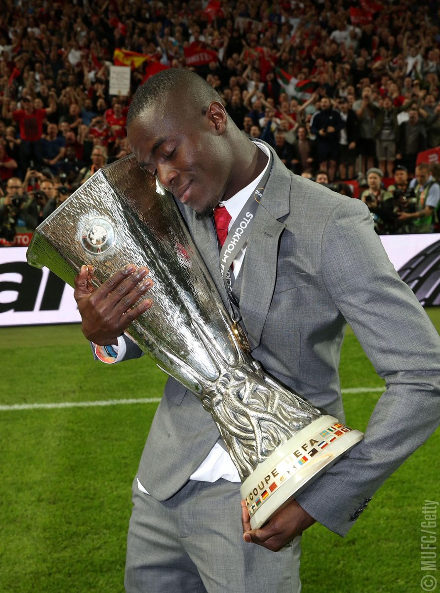 ManUtd's tweet photo. Find someone who holds you the way birthday boy @EricBailly24 holds the #UEL trophy ❤️ https://t.co/nm65bPLNp9