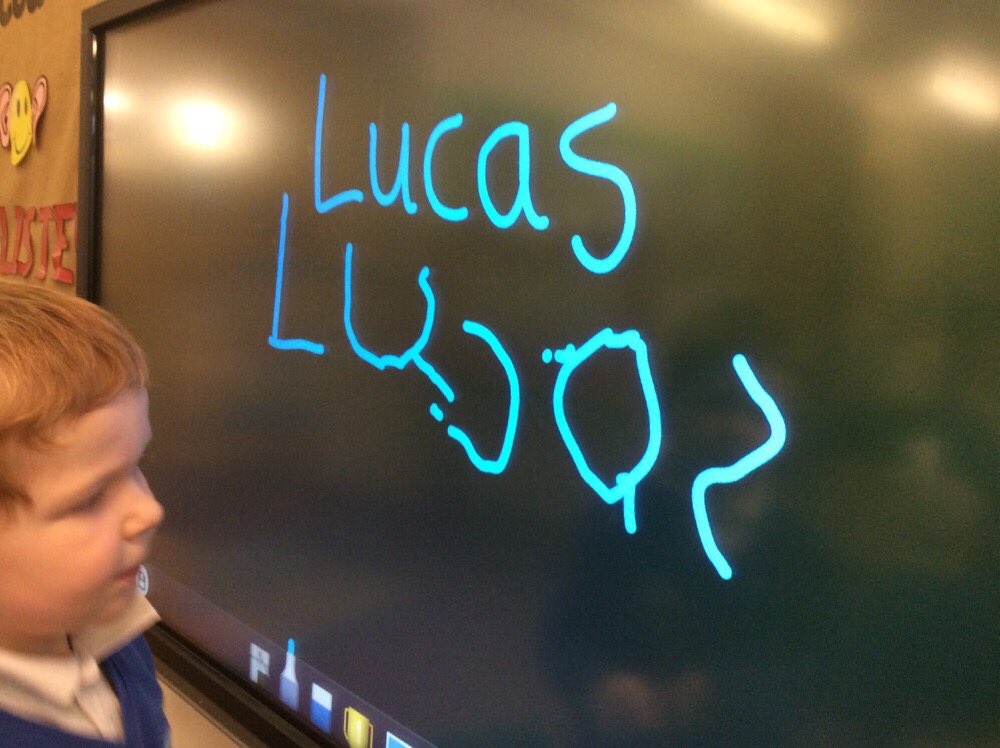 CatcliffePS's tweet image. Using the IWB to practice our name writing! #nurseryfun