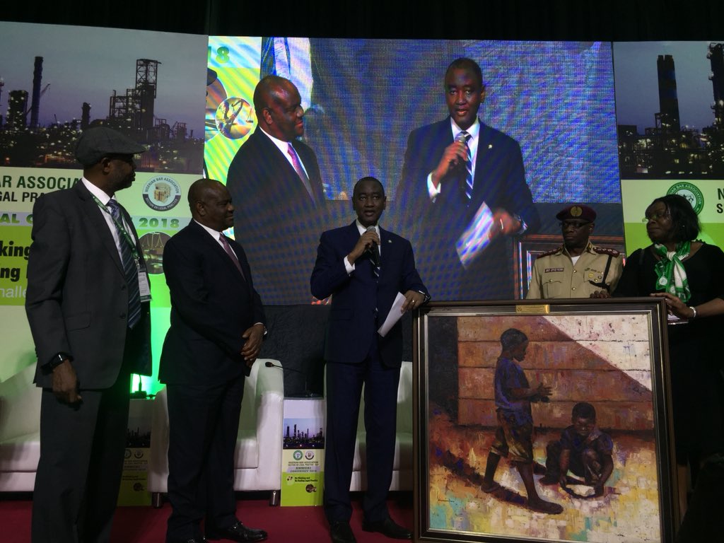 OPNBAofficial's tweet photo. @abmtwitt presenting an artwork to Rivers State Governor @Gov_Wike on behalf of the NBA, for his immense contributions to the Nigerian Bar Association.

The painting was done by Johnson Uwadinma, a contemporary Nigerian artist who lives in PortHarcout. #OPNBA #NBASLPConference https://t.co/V6lYe1h4tH