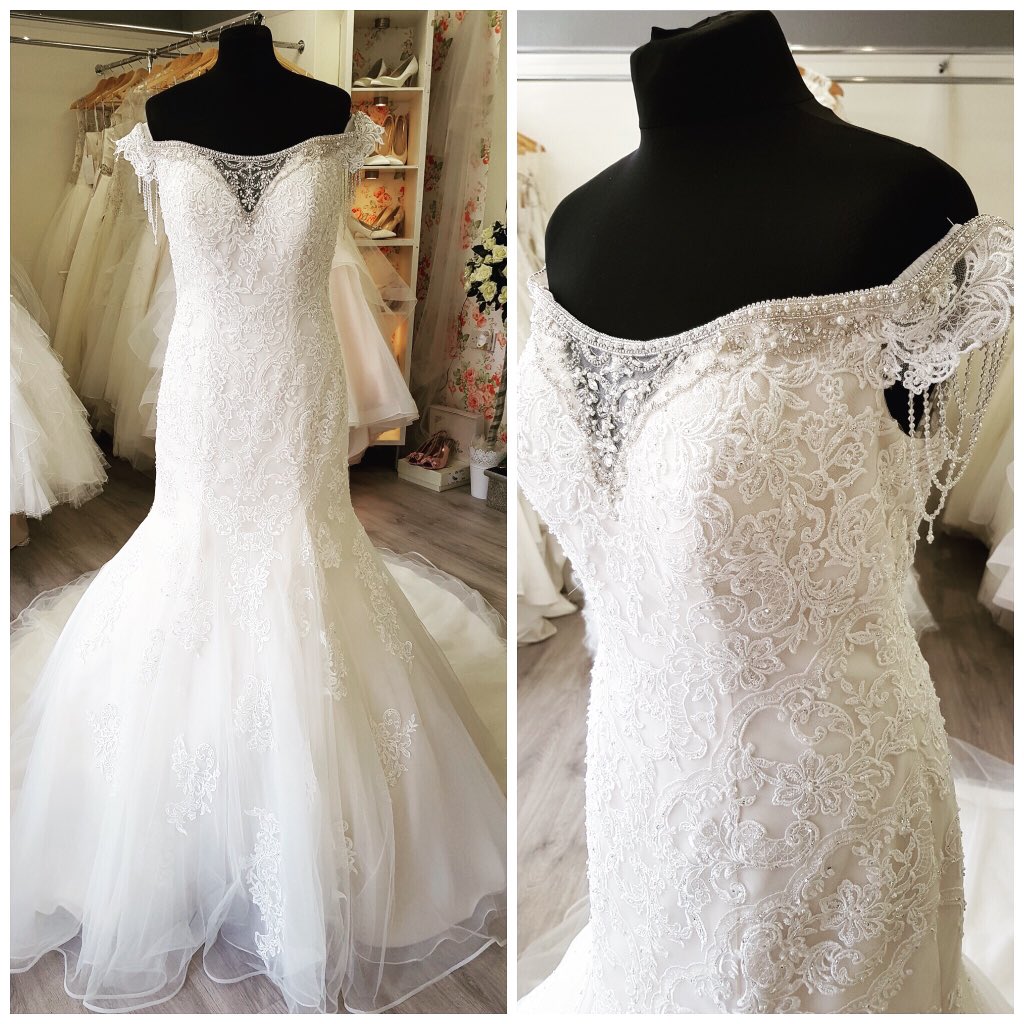 Sophia Tolli Minerva 💕 richly beaded of the shoulder gown with pearl and crystal draped detail on the shoulders 😍 #sophiatolli #sophiatollibride #beading #lace #crystal #weddingdresses #stockportbride #stockportweddings