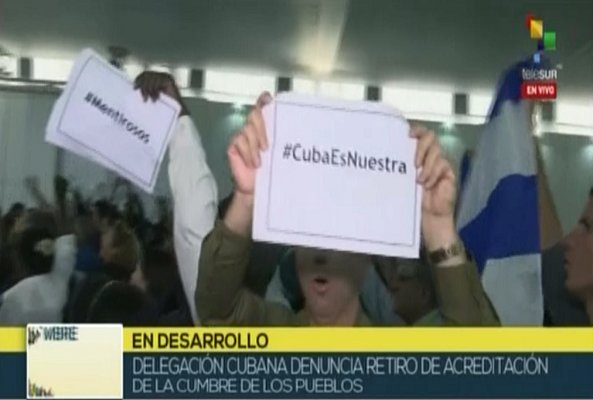 cadenagramonte's tweet photo. Irrespeto hacia #Cuba en Foro de la Sociedad Civil de #CumbreDeLasAmericas. Representante de la Isla pide la palabra y denuncia la presencia de mercenarios en la sala; le cortan el audio y en protesta la delegación cubana se pone en pie #ConCubaNoTeMetas https://t.co/krX2lxkT1Y