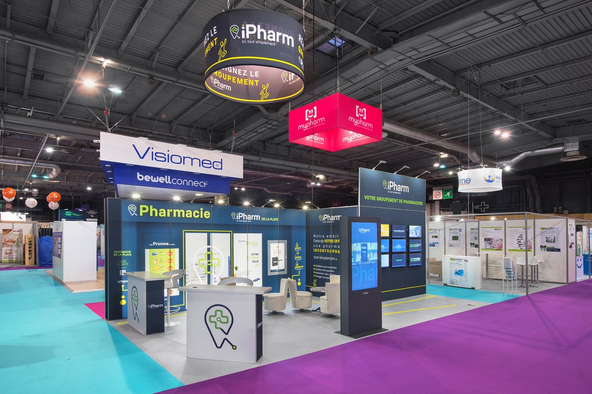 StandsEvolu's tweet photo. Retour sur l'une de nos réalisations sur Pharmagora : 2 stands en 1 pour le groupe IPharm et MyPharm. 2 stands de 48m² sur le même espace avec une conception visuelle différente mais impactante ! #EVOLU #MODULAIRE #STANDS https://t.co/T9WwVHcfgp