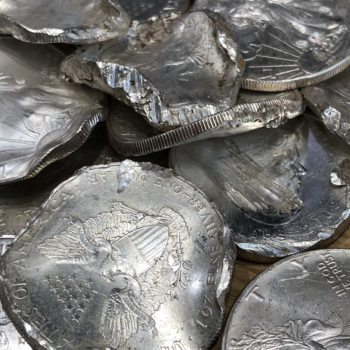 This is what happens to silver bullion coins when they go through an industrial shredder at a recycling centre!