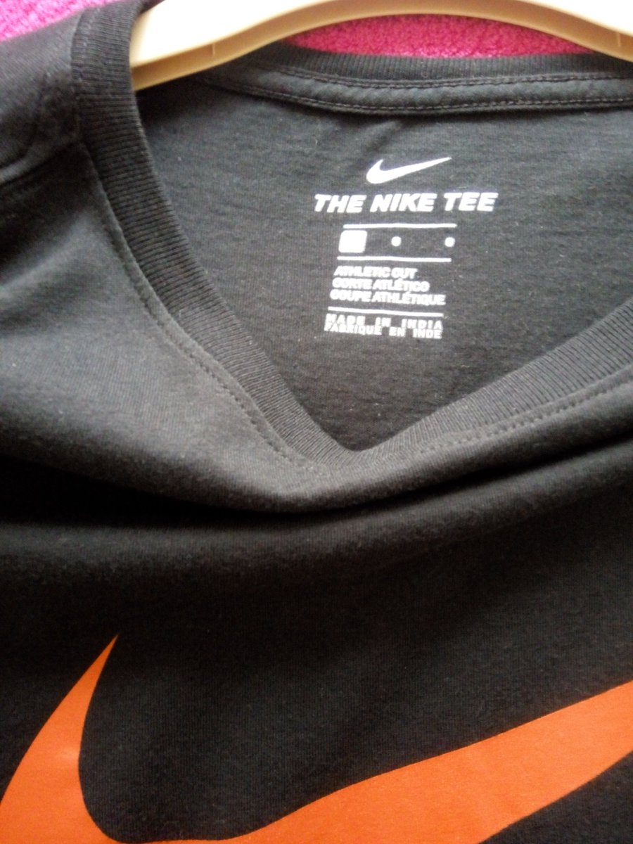 WES_Legend_4eva's tweet photo. @nikestore @Nike @nikesportswear these 2 t-shirts are both mens large. As you can see the blue one is longer which was made in South Africa. The black one is made in India. I have about 8 nike t-shirts that are made in India that I can't wear because it's too short on my stomach. https://t.co/f8e0qjQV66