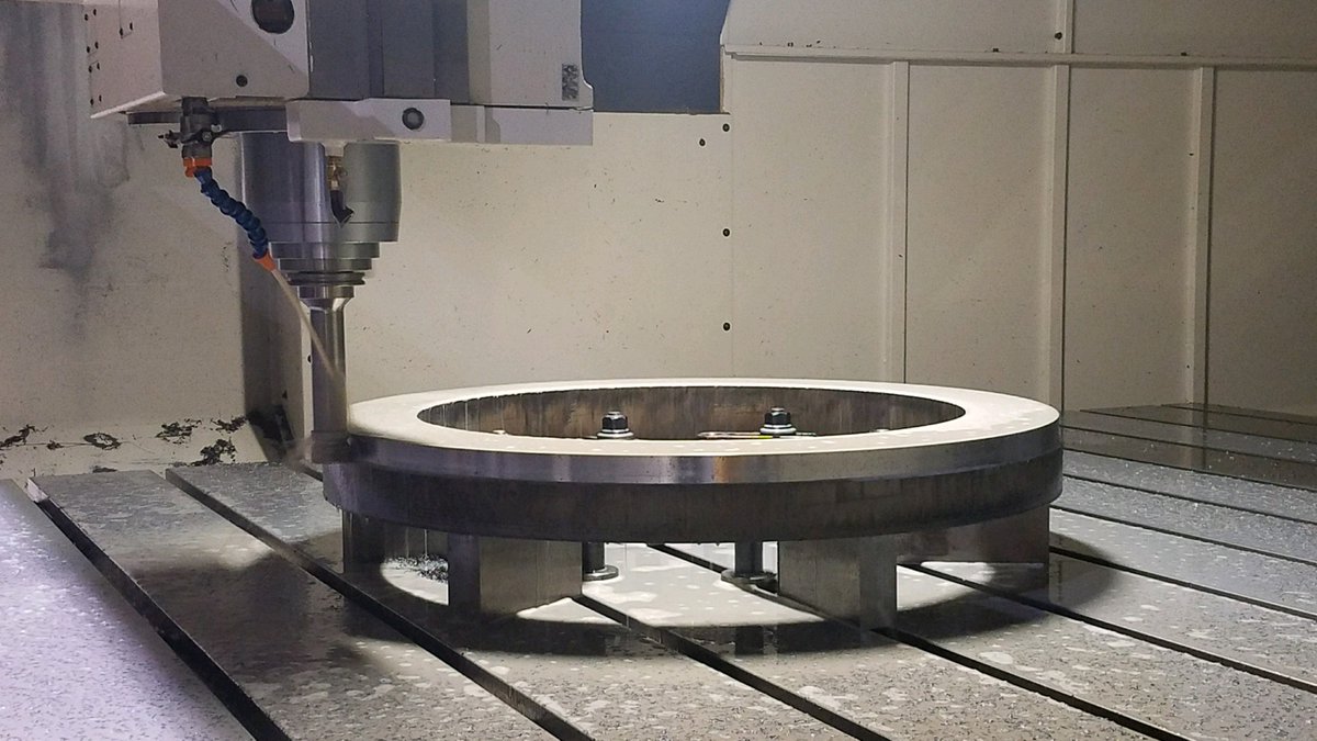 Our #Viper is #machining 40 thousandths off each rotation, eventually totaling a quarter inch shaved. The diameter of the entire piece -40 inches. Mental state of the #machinist- slightly dizzy. #CNC #CustomMachining #manufacturing