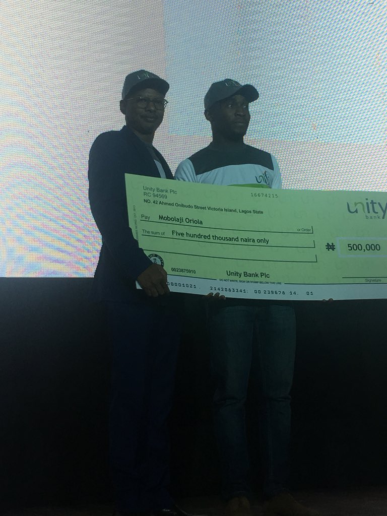 WhistleTalks's tweet photo. Mobolaji Oriola is the winner of the Humanitarian category of #TheUniFiers &amp; currently being presented with his cash award at the #UniFi  campus storm in New Auditorium, Unilag. https://t.co/D0RUzz9MRi
