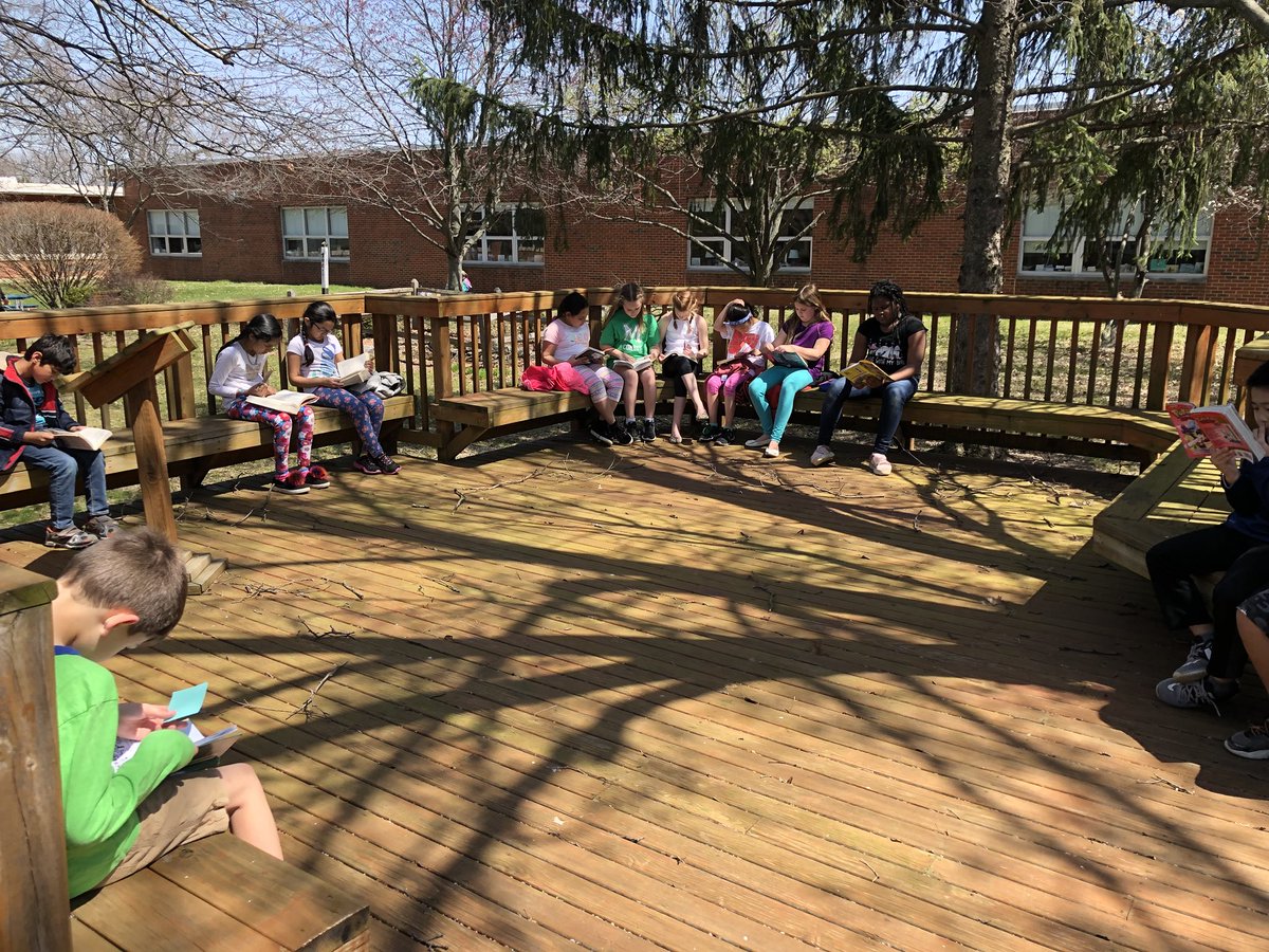 Spending time reading in a new environment as we soak up some sunshine! #masonshines