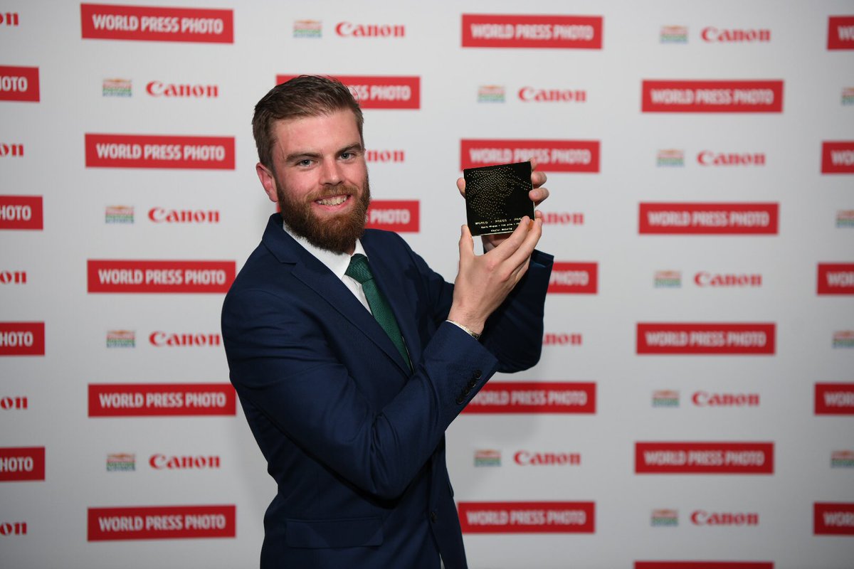 sportsfile's tweet photo. CONGRATS WORLD PRESS winner. Sportsfile photographer Stephen McCarthy has been awarded 2nd prize in the Sports category at the @WorldPressPhoto Awards. Here is Stephen with his award tonight. #Smiles #CapturingHistory #WPPh2018 #WorldPressPhoto https://t.co/r4BePlKO51